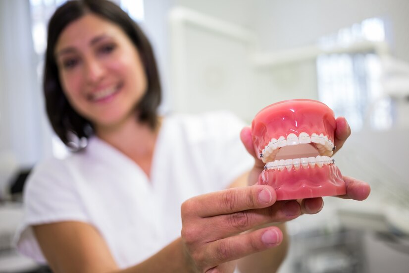 Mini Dental Implants vs. Dentures